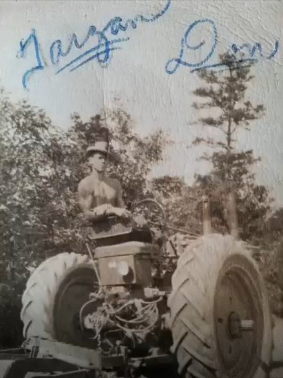 A Cox grandfather on the tractor